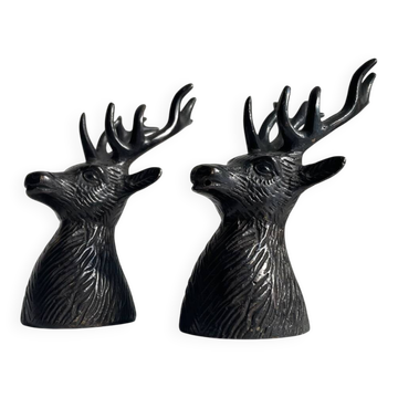 Salt and pepper shaker set with patinated brass deer heads.