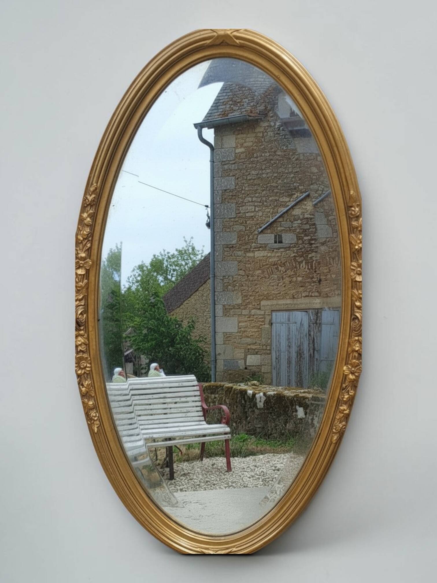 Miroir ovale en bois doré, style Louis XVI