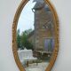 Miroir ovale en bois doré, style Louis XVI