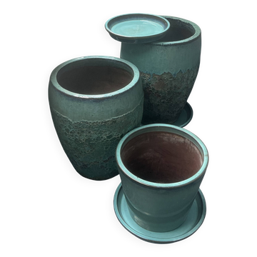 Set of 3 large blue glazed stoneware pots.