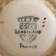 Paire de raviers et saucière ancienne en faïence de Longchamp