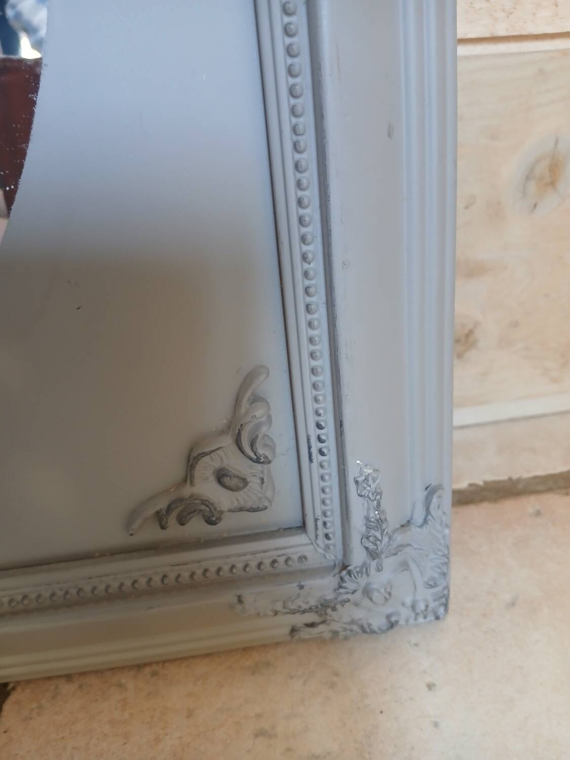 Mirror with a grey wooden frame