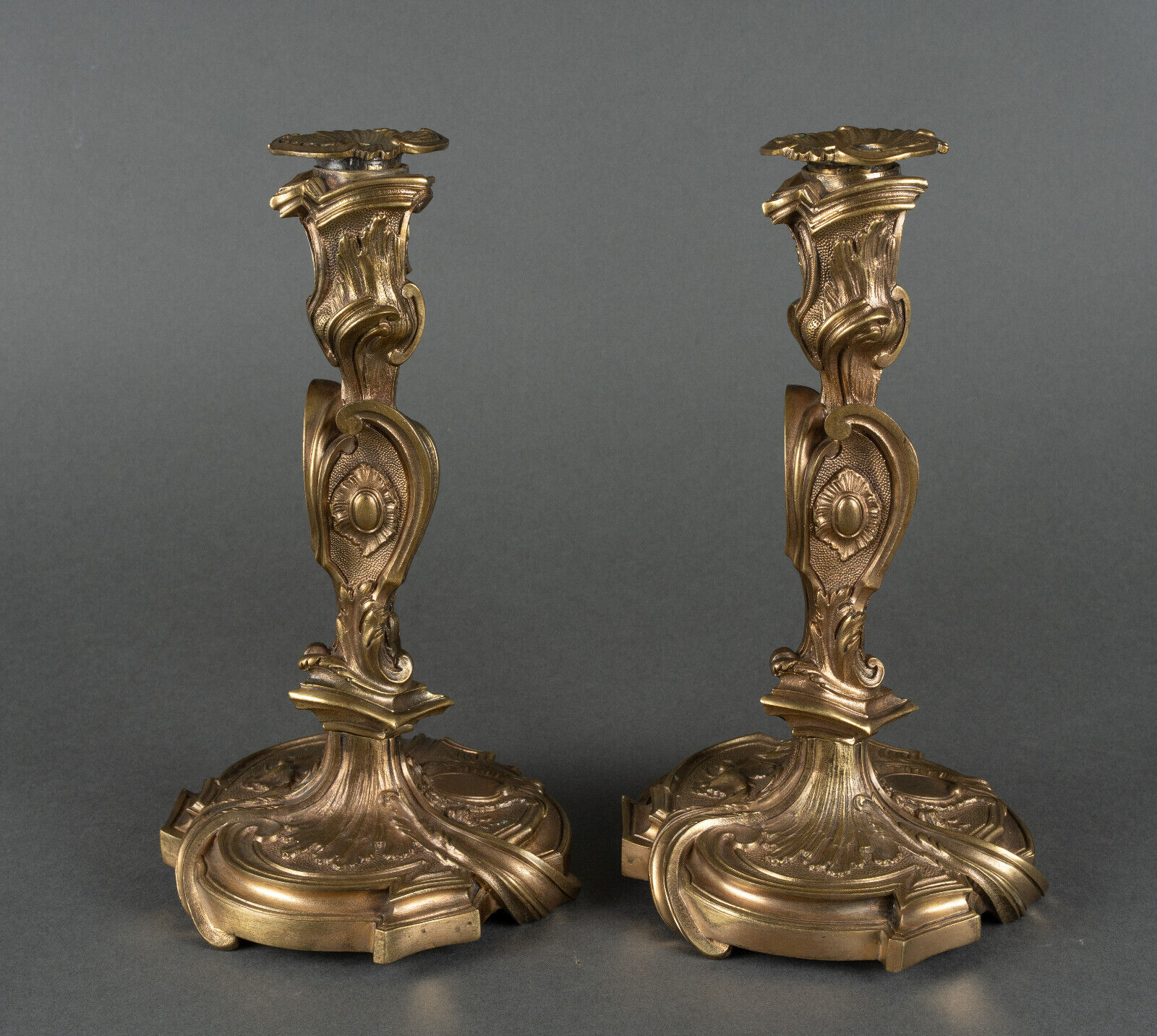 Pair of candlesticks xixth louis xiv ornamentation shells gilded bronze