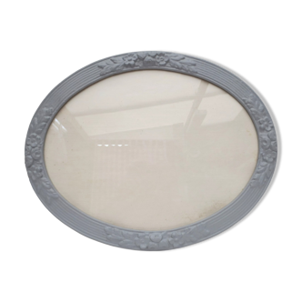 Old medium-sized oval frame in old grey wood color with patterns