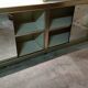 Ivory-colored and matte gold anodized aluminum display bookcase