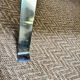 Vintage coffee table from the 60s and 70s in ceramic, chrome metal, and wood.