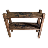 Wooden shelf on legs in popular raw wood.