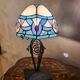 antique wrought iron lamp, 1900 to 1930 with stained glass lampshade soldered with lead