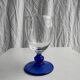 Set of 2 small king-shaped stemmed glasses and 2 small ball-shaped stemmed glasses