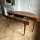 Large oval table from the early 19th century in walnut, 3.17m with extensions.