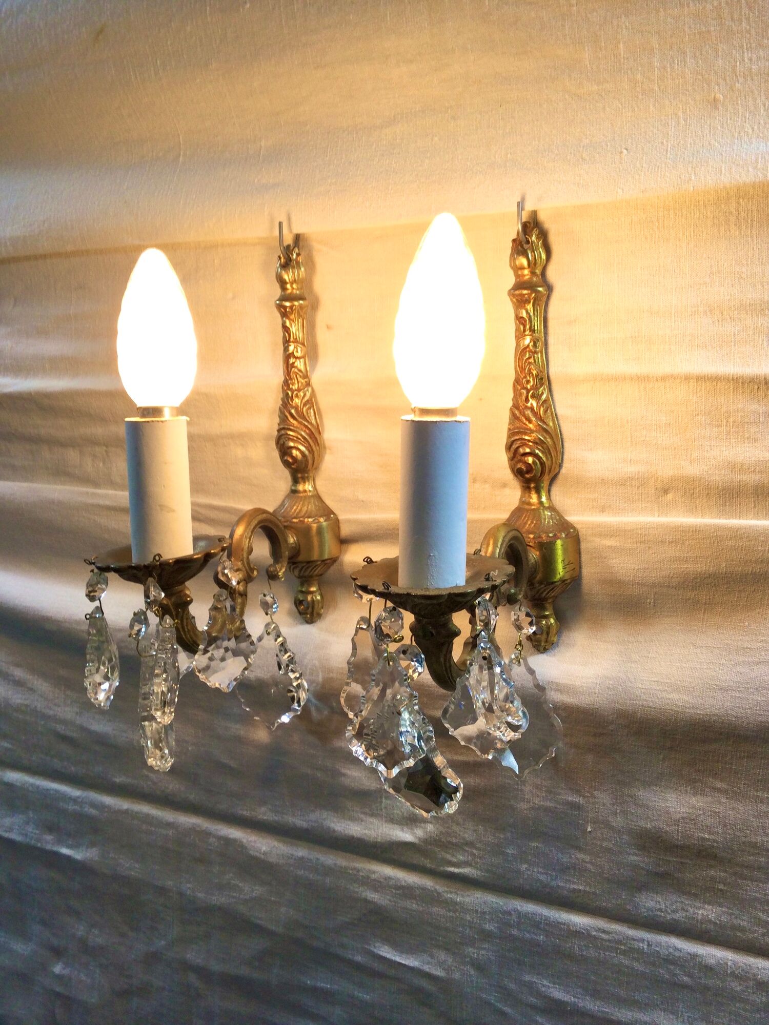 Pair of 1-light bronze sconces and Louis XV style stamps