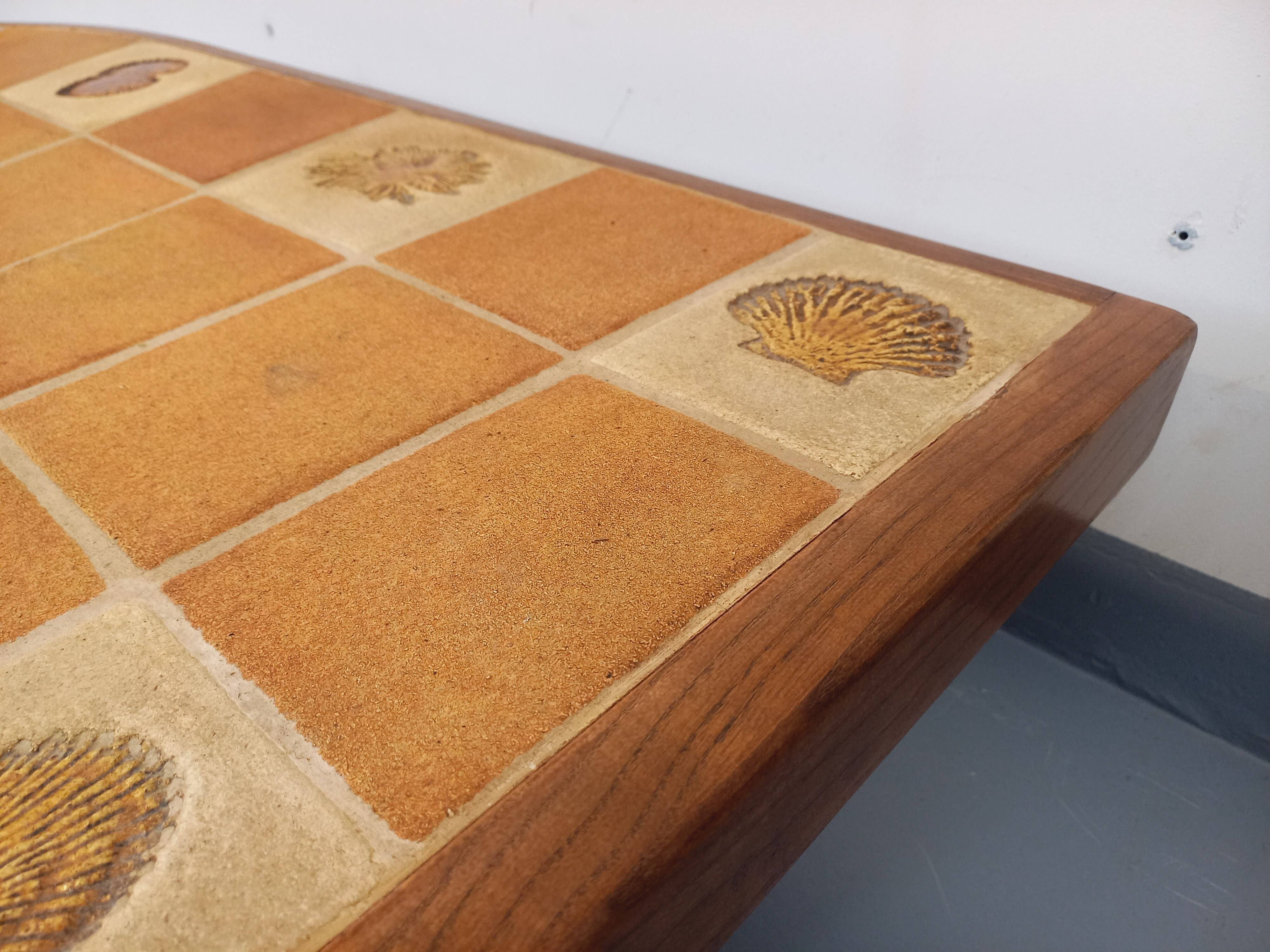 Barrois vintage shell-patterned comma coffee table in wood and ceramic.