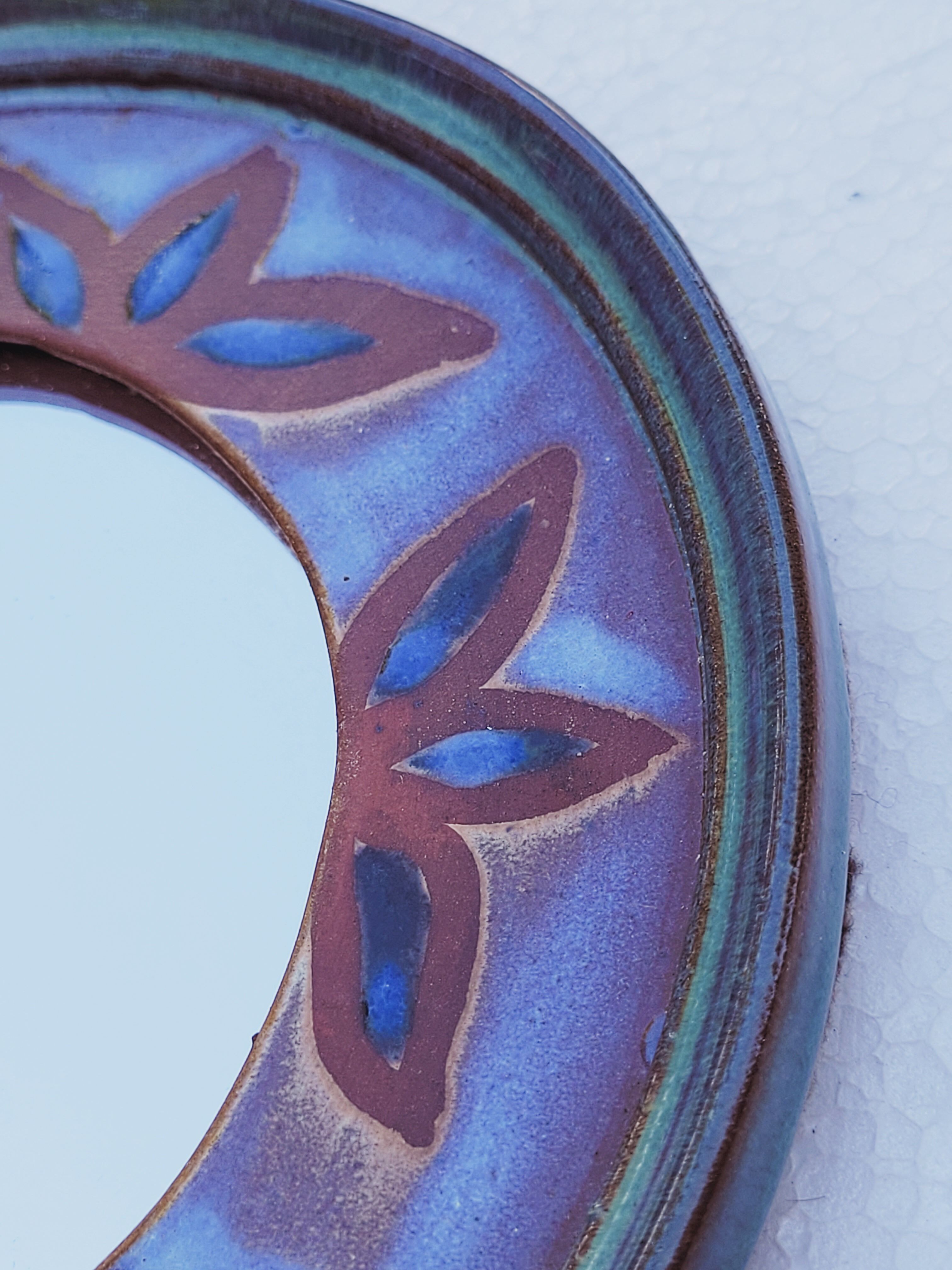 Vintage ceramic mirror dequeker