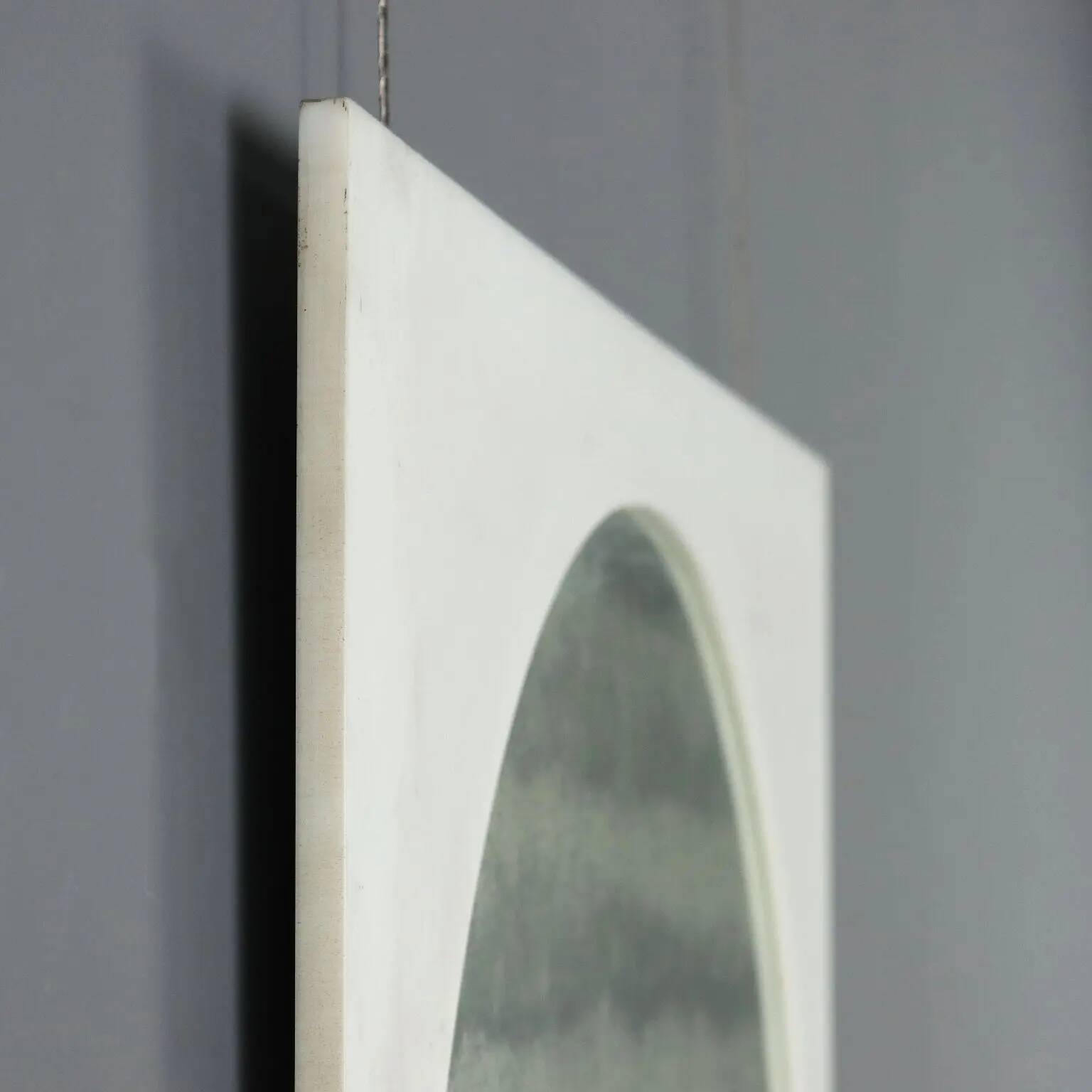 Vintage mirror in glass and perspex, Italian design from the 1970s.