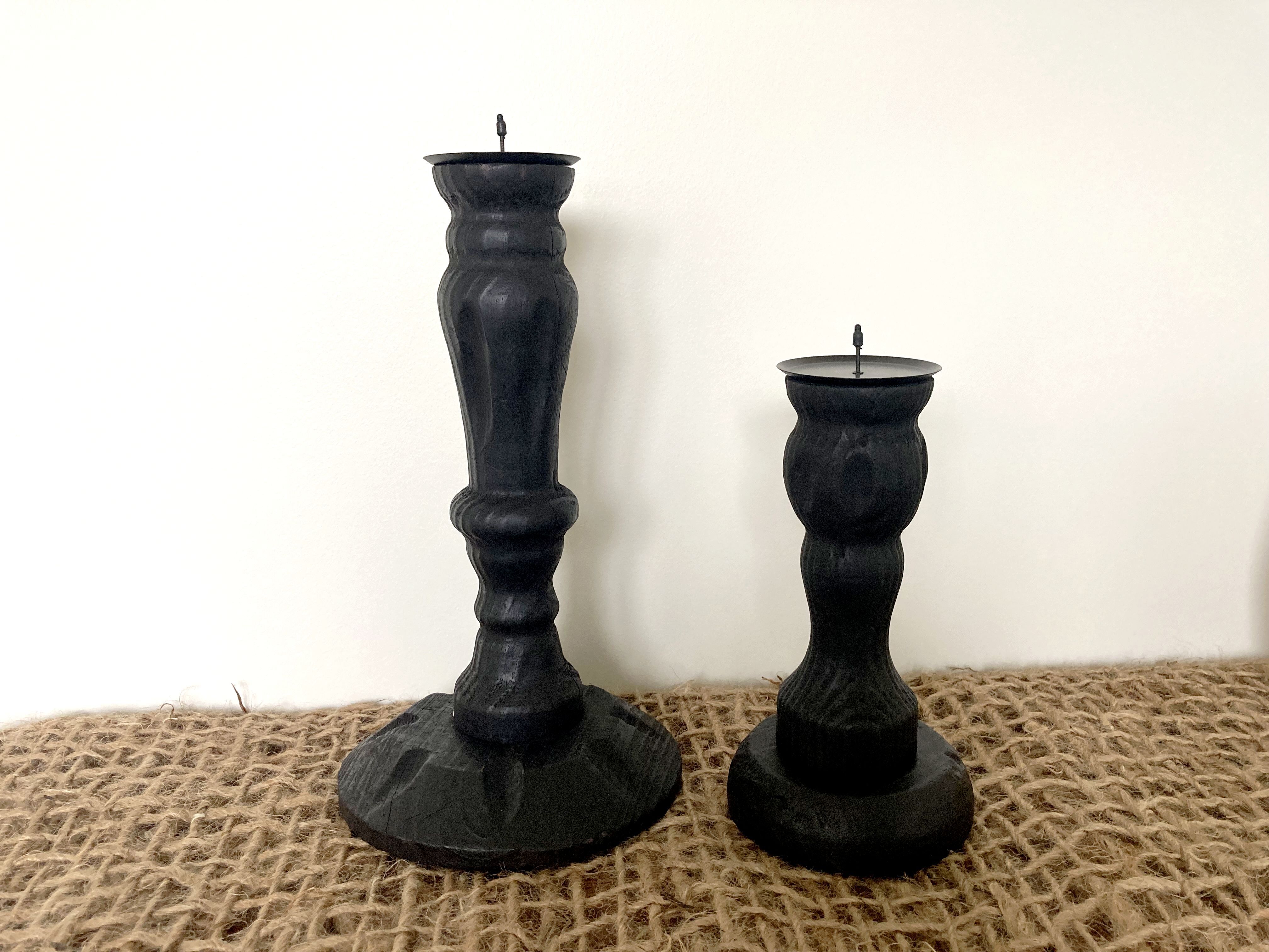 Black wooden candlesticks