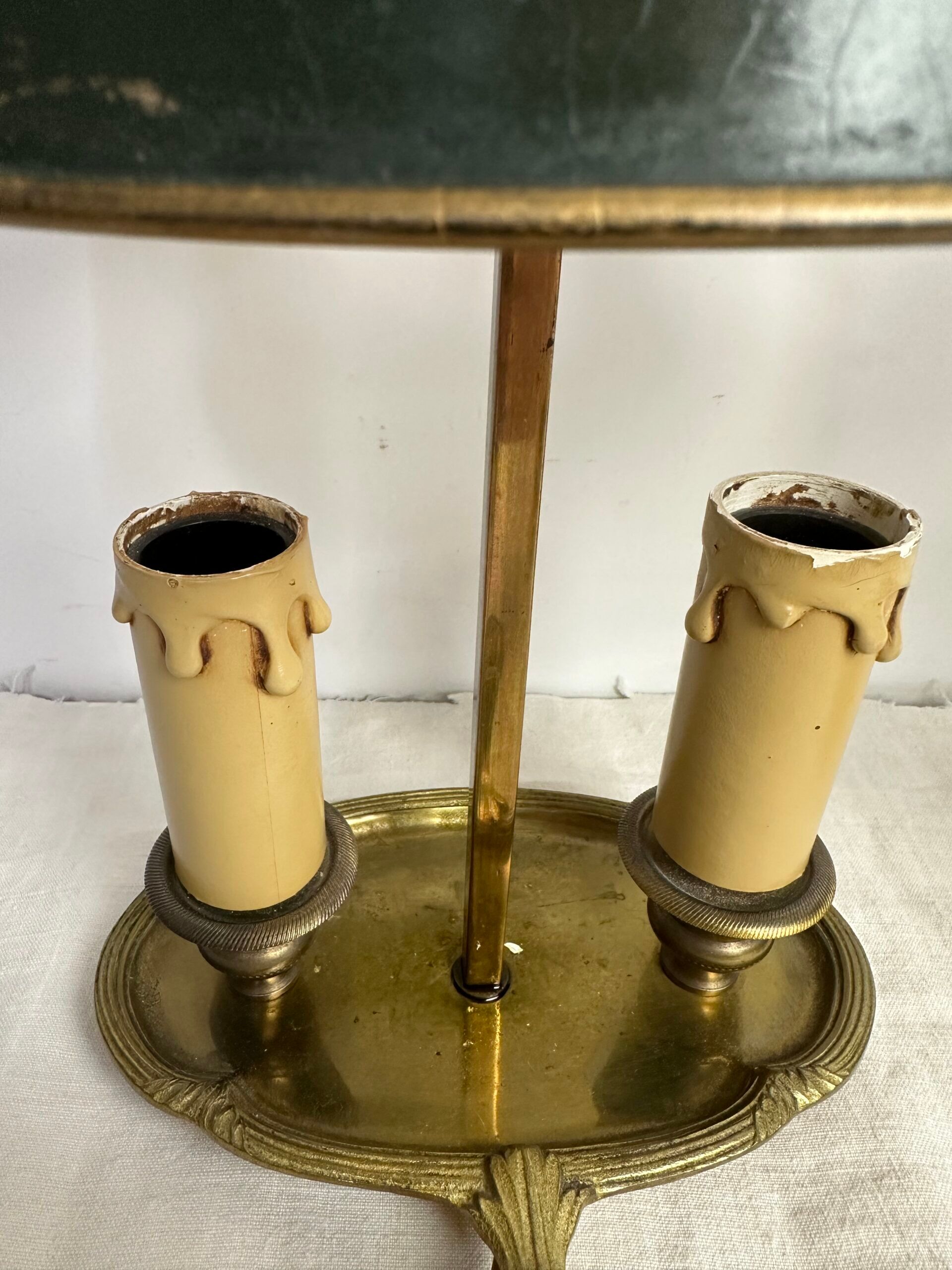 A pair of old brass bed warmers.