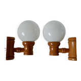 Pair of globe wall lights in pine and opaline from the 60s