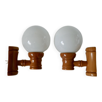 Pair of globe wall lights in pine and opaline from the 60s