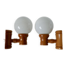 Pair of globe wall lights in pine and opaline from the 60s