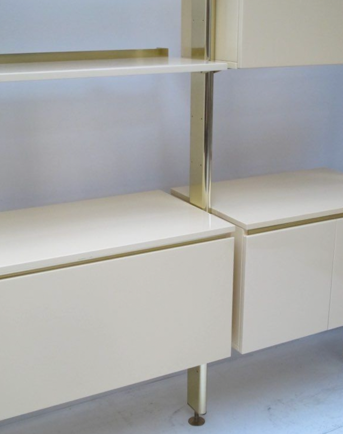 Ivory and brass lacquered library, International furniture 1970