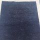 Tapis en laine noire