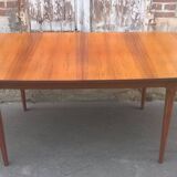 Extendable teak dining table