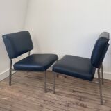Black leather armchairs