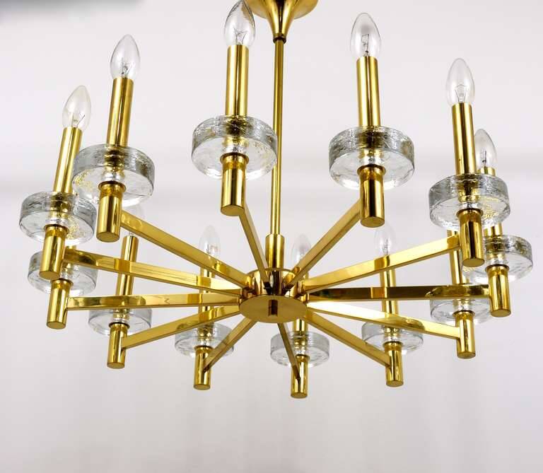 Brass and glass disc pendant light in the style of Gaetano Sciolari, mid-century, Italy, 1970s.
