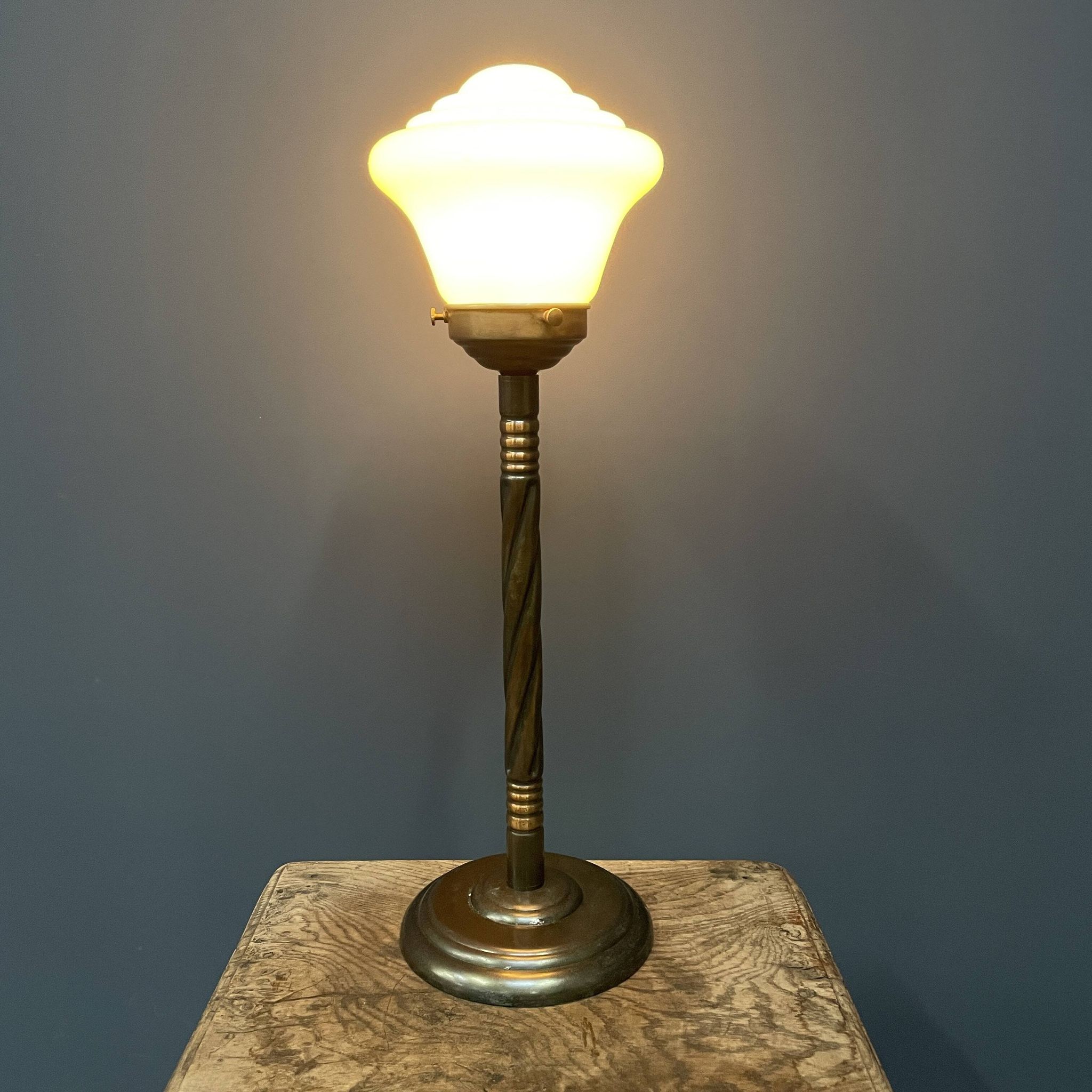 Standing copper table lamp with glass shade