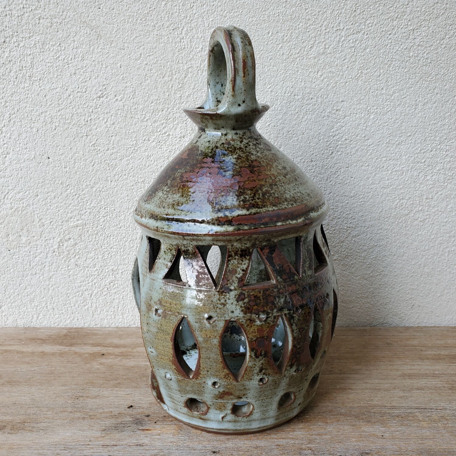 Signed sandstone lantern candle holder