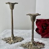 Pair of metal flower candlesticks