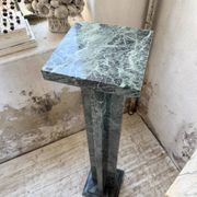 Set of 4 marble columns or pedestals.