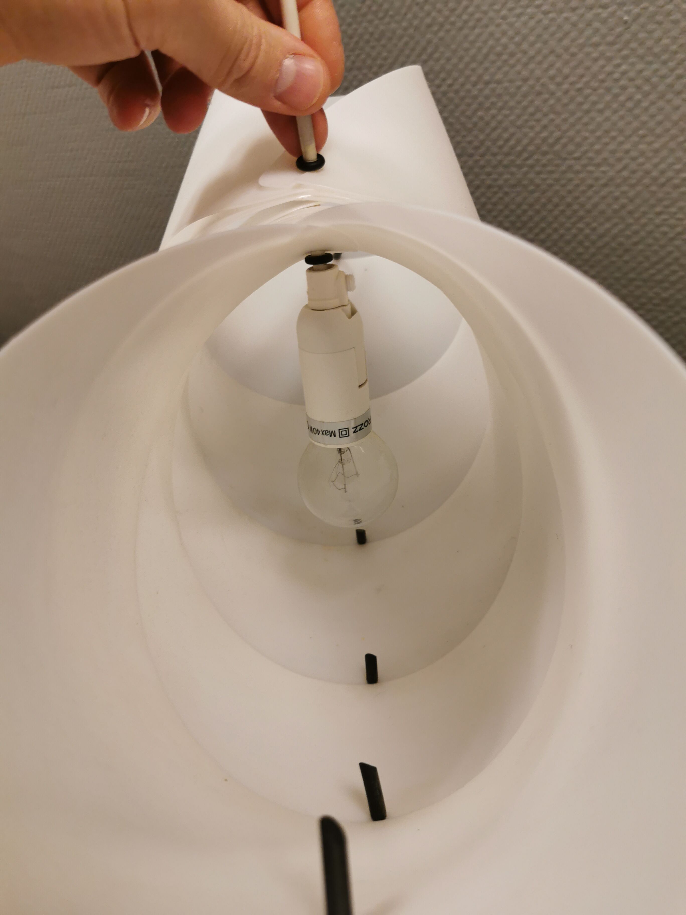 Danish conch, snail shell hanging lamp from the 80s, made of hard ABS plastic.