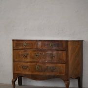 18th century, antique Danish baroque serpentine chest of drawers in walnut.