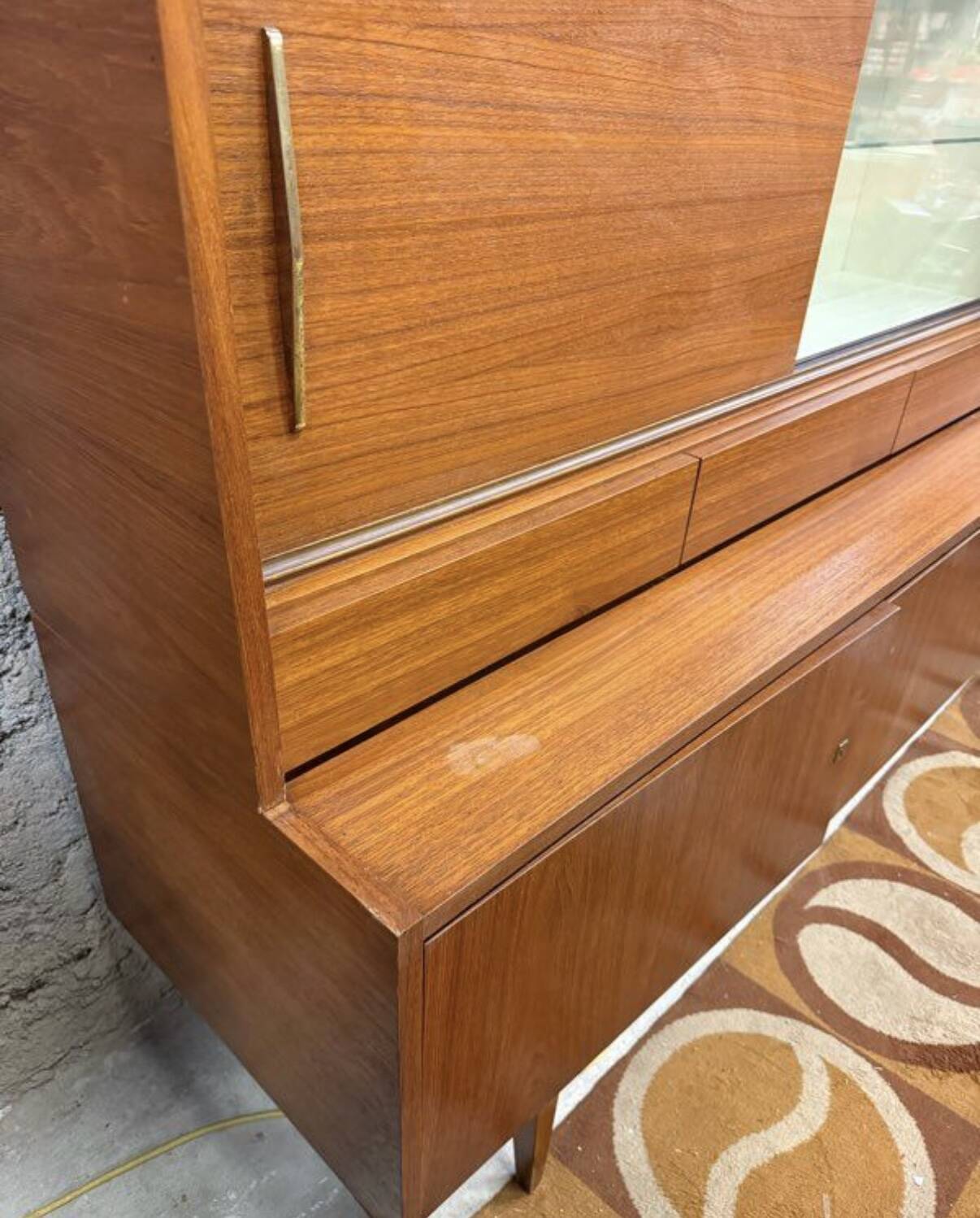 Vintage Scandinavian teak sideboard with compass feet from the 70s