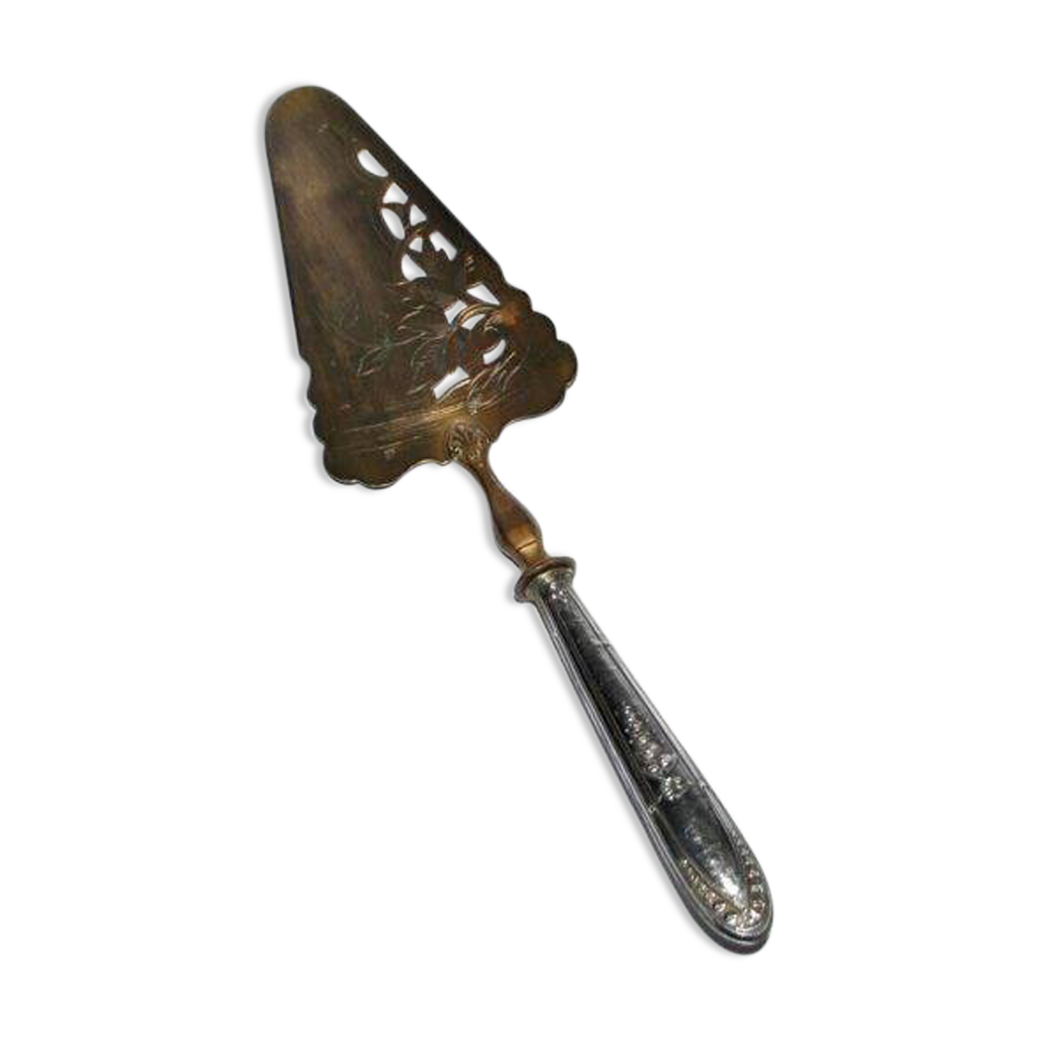 Antique silver-plated pie server with a brass blade decorated with roses.