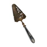 Antique silver-plated pie server with a brass blade decorated with roses.