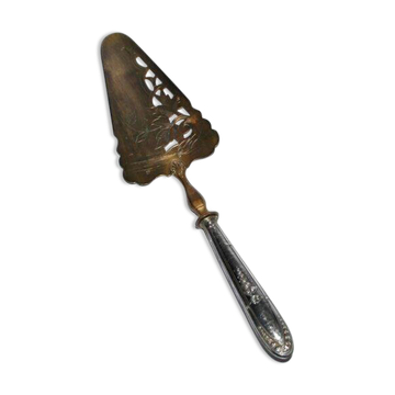 Antique silver-plated pie server with a brass blade decorated with roses.