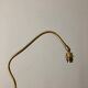 1950 floor lamp rises downwards in diabolo brass