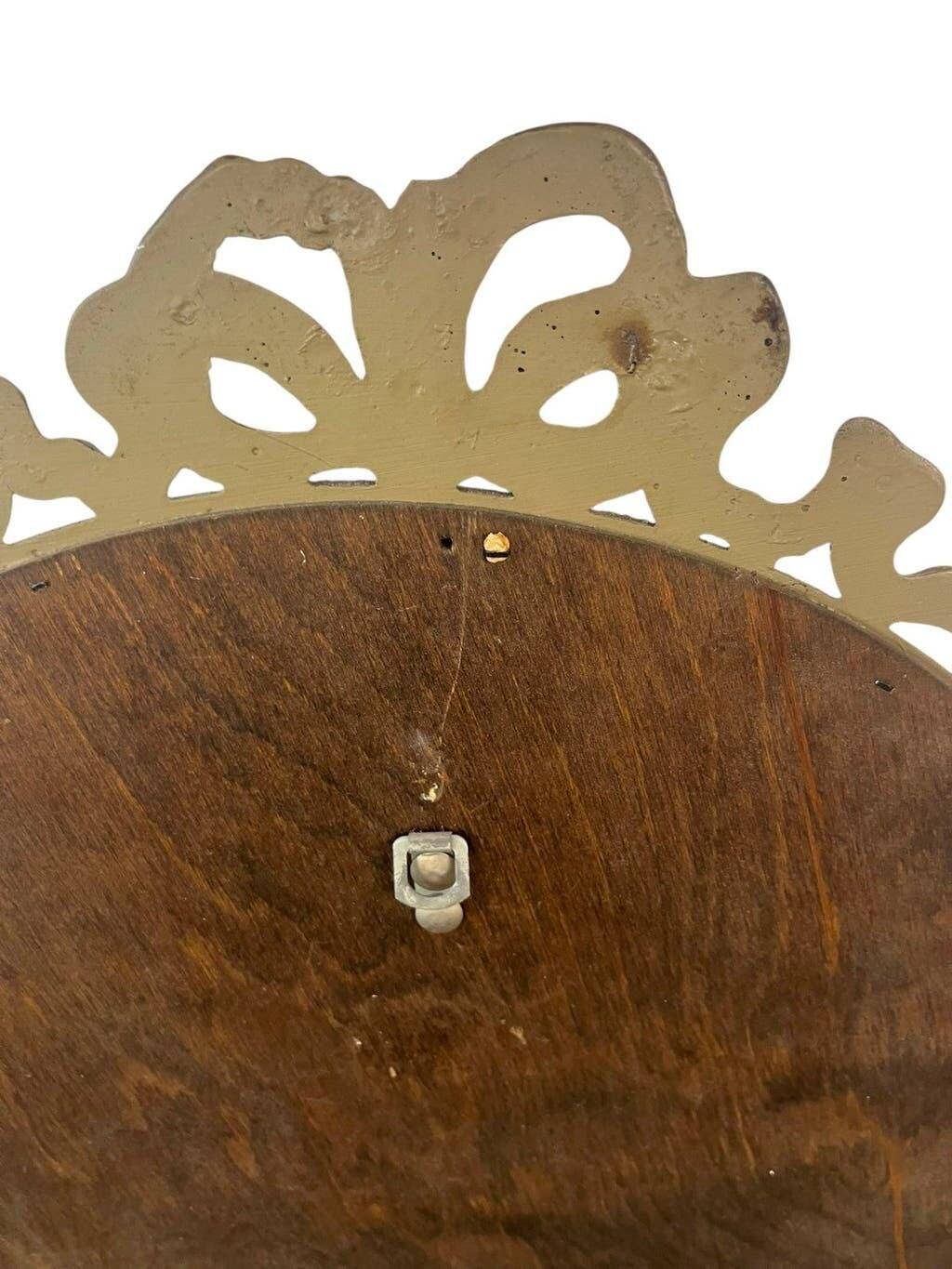 Miroir mural ovale baroque vintage à décor de noeud