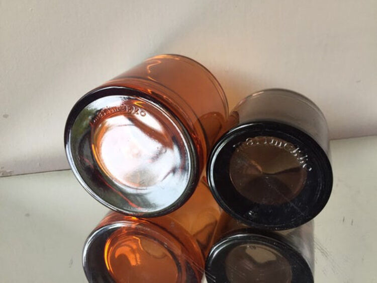 Kivi Iittala candle holders in orange and cinnamon glass 1988