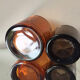 Kivi Iittala candle holders in orange and cinnamon glass 1988