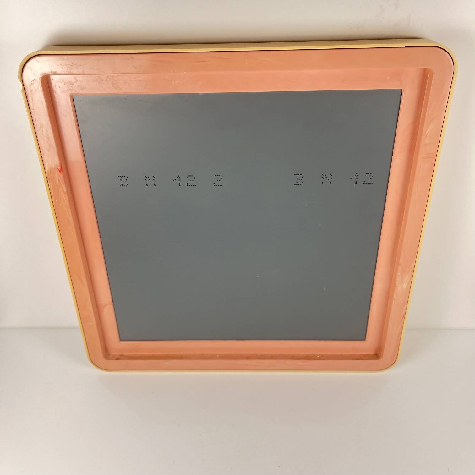 Square plastic mirror with rounded edges, cream, 1970s/80s.