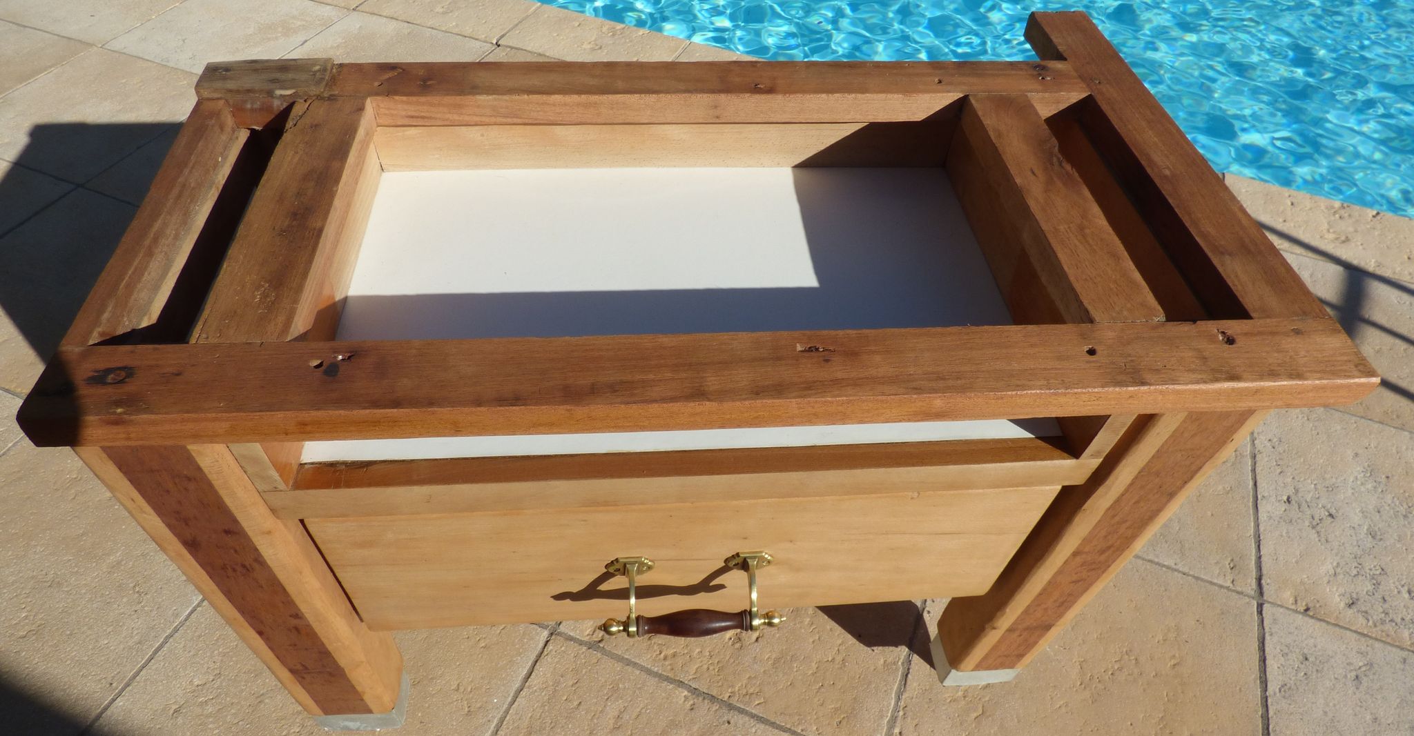 Butcher's log cabinet with two drawers and location for kitchen utensils