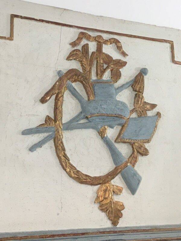 Louis XVI style mirror in patinated carved wood