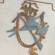 Louis XVI style mirror in patinated carved wood