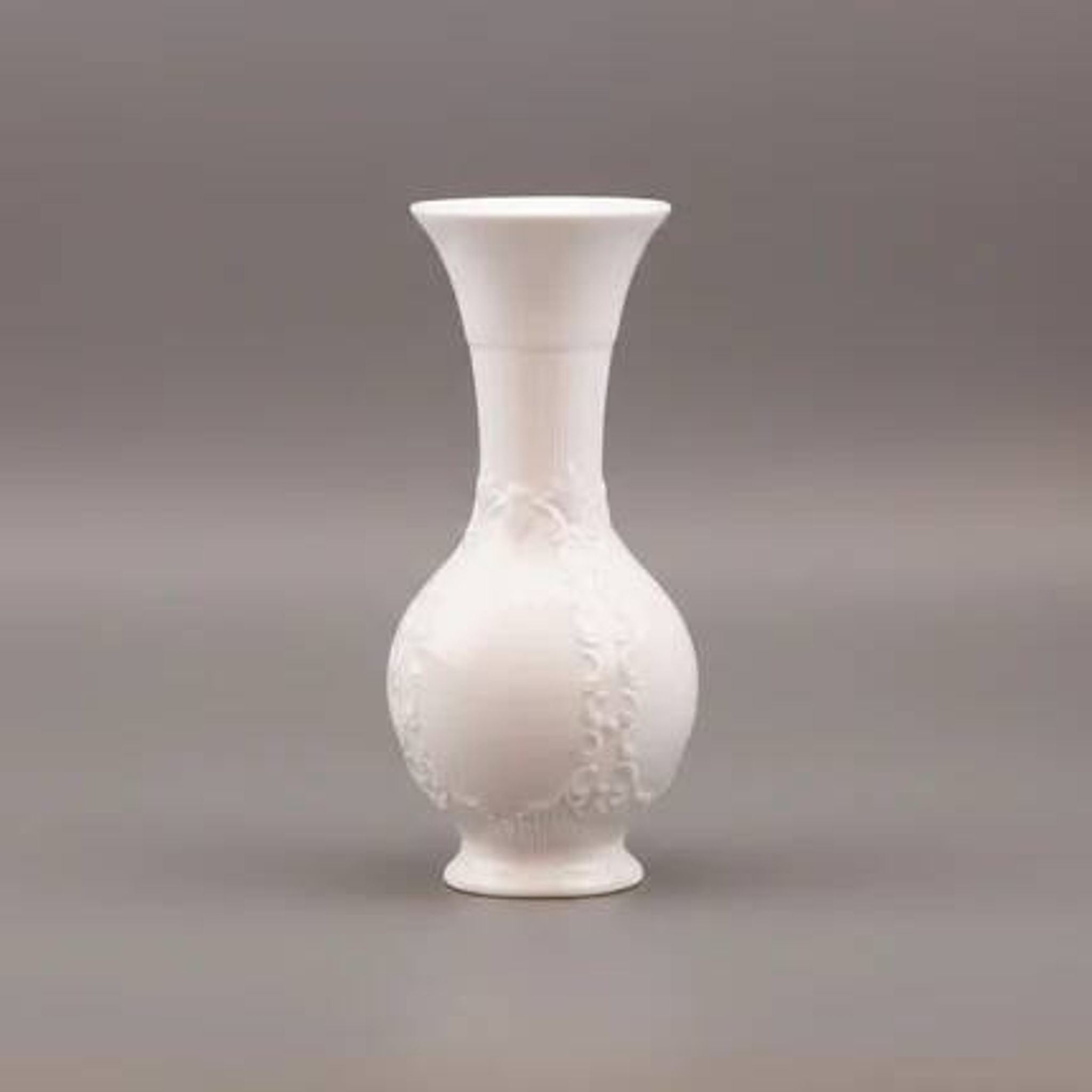 Vintage white porcelain vase Royal Porzellan Royal Bavaria KPM with textured patterns.