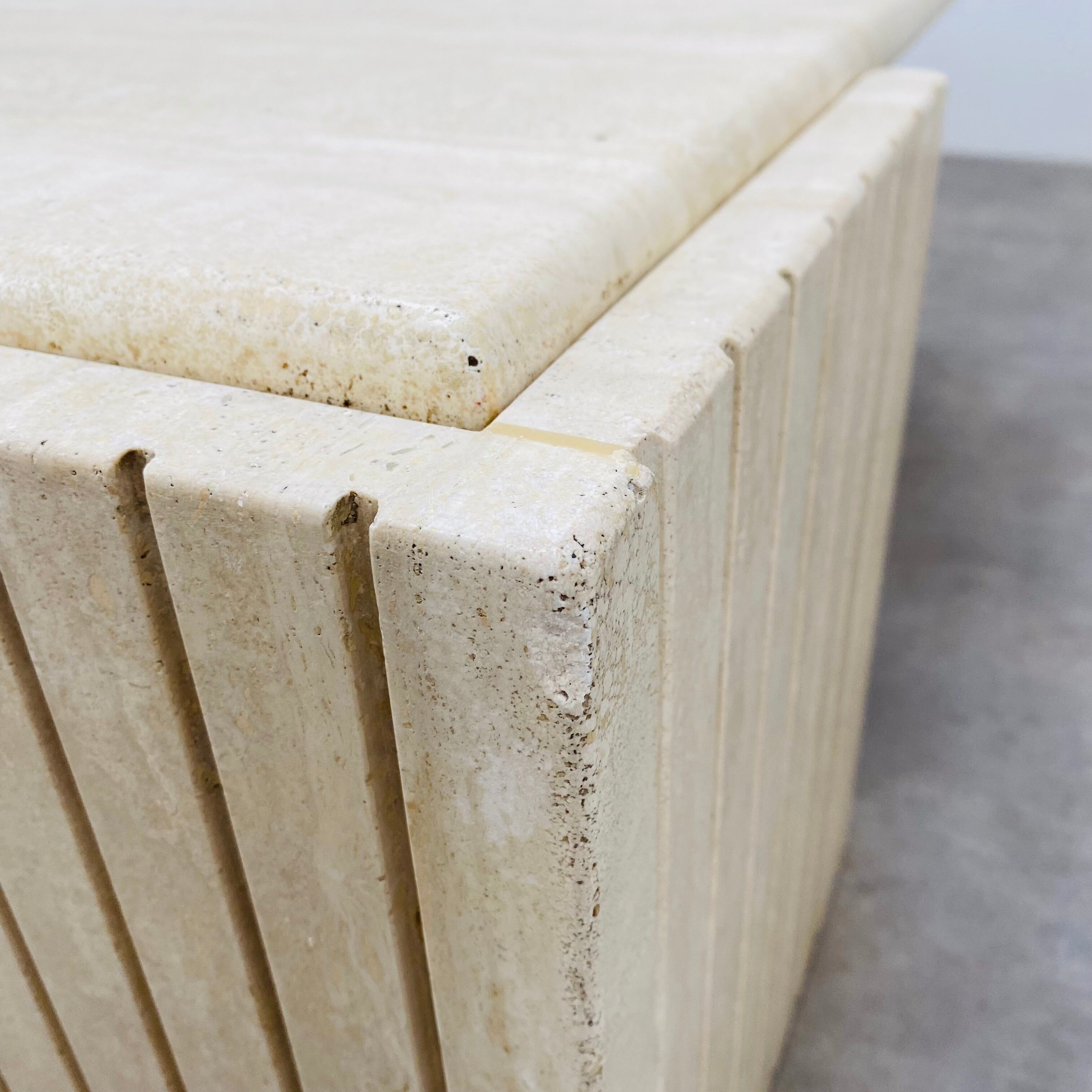 Travertine eye coffee table Roche Bobois