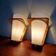 Pair of Philips teak and opaline wall lights, designed by Louis Kalff, 1950