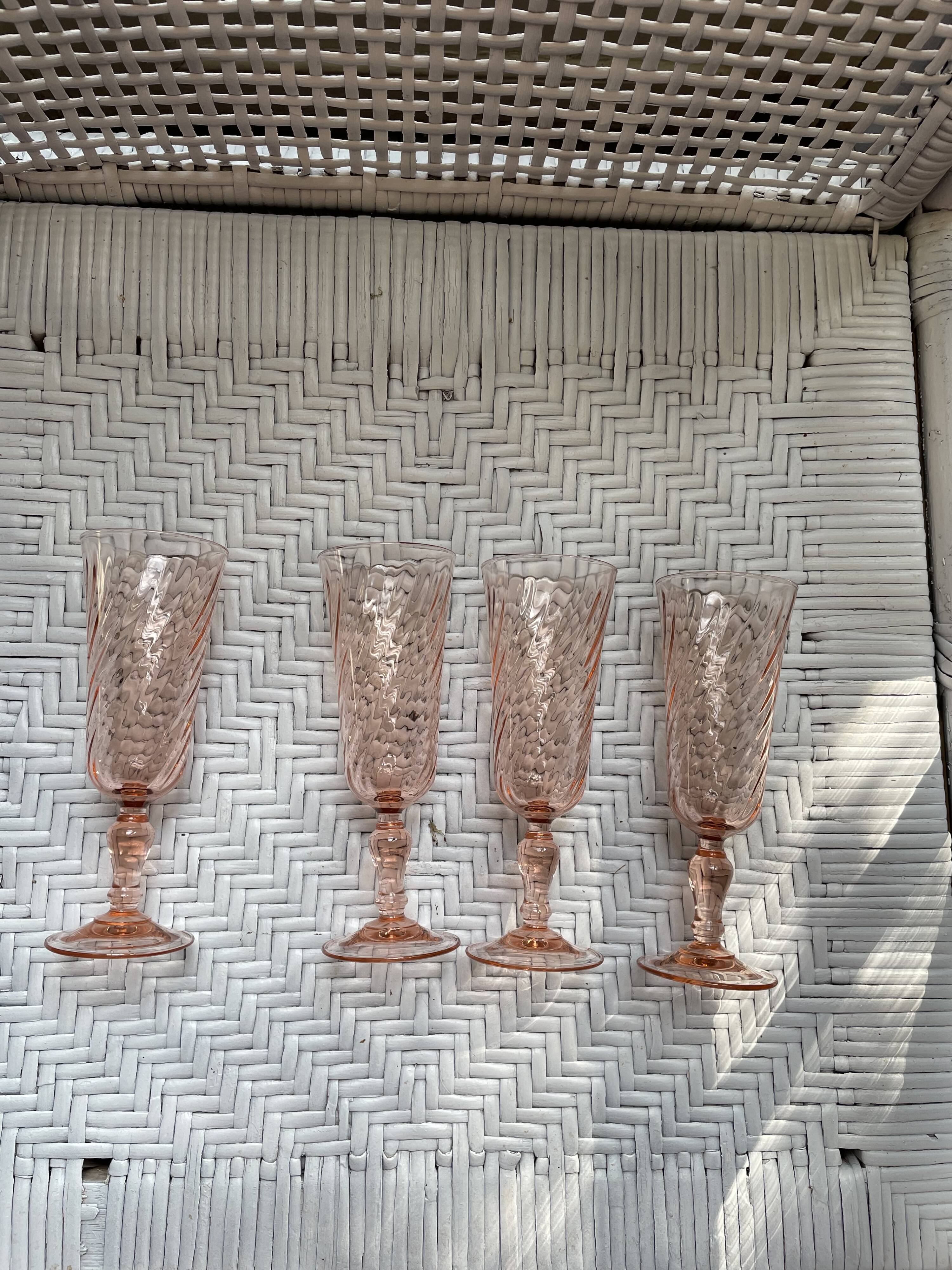 Pink glass champagne flutes from Arcoroc Luminarc model Rosaline